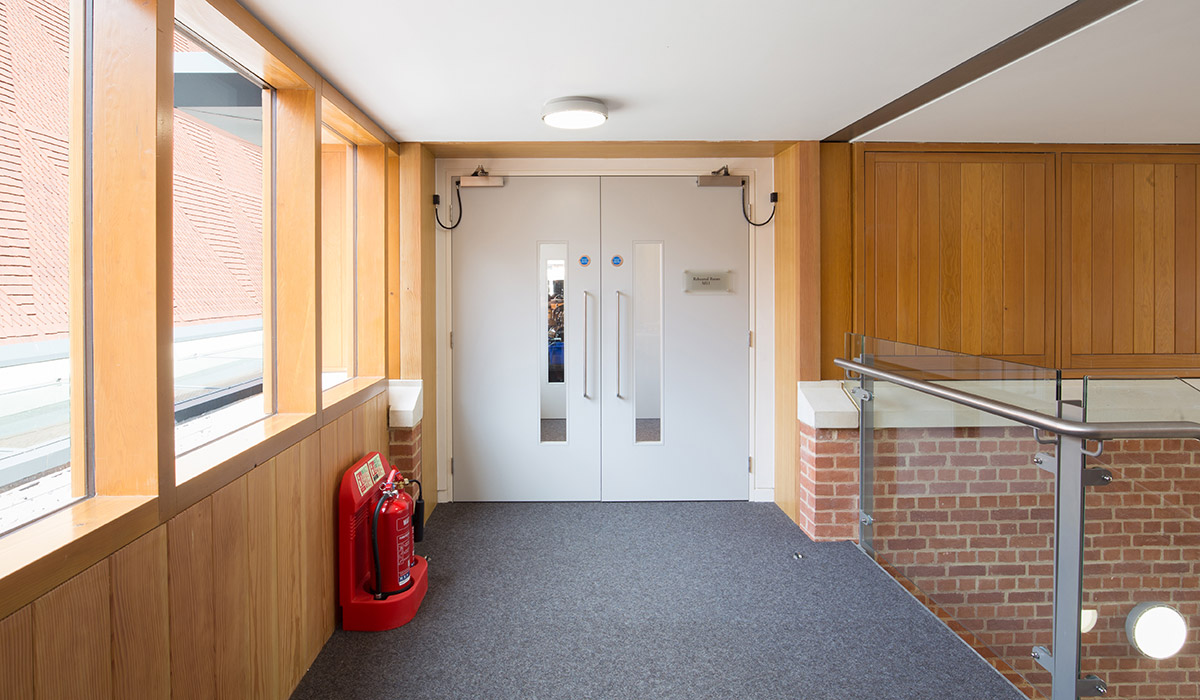 Shadbolt_paint_lacquered_fire_doors_at_KCS_New_Music_School